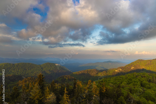 Large clouds at dusk above the forested mountains, Bijele stijene reserve in Croatia