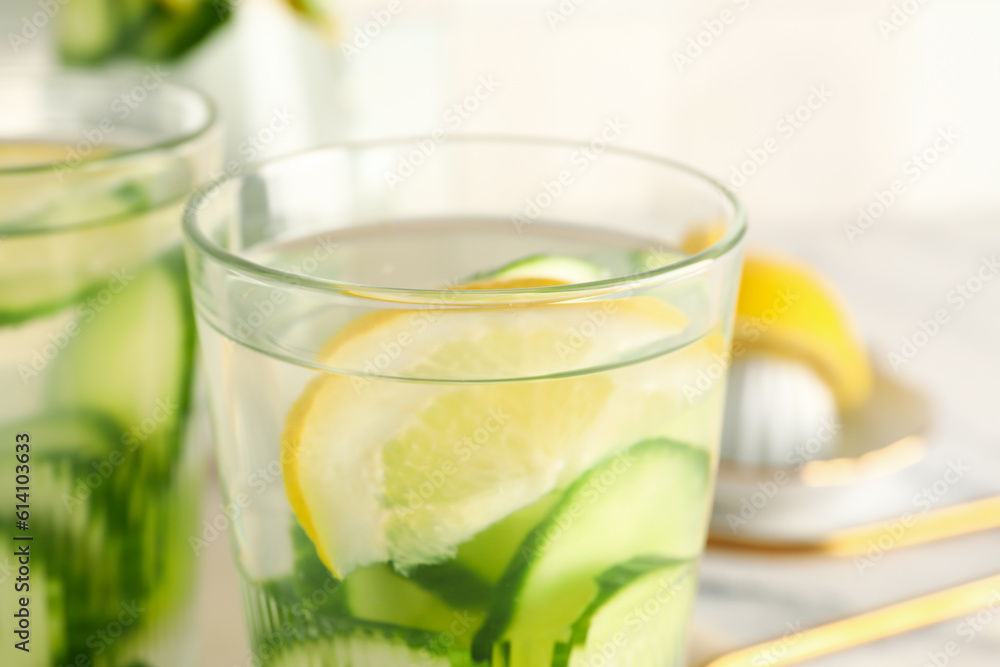Glasses of infused water with cucumber slices, closeup Glasses of infused water with cucumber slices, closeup