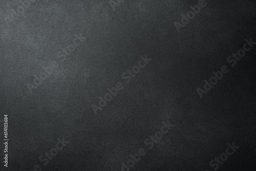 Monochrome black and graphite photo background. Free space for text. Top view.