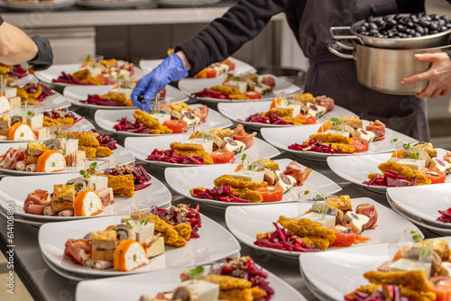 A chef arranging a plate