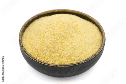 Quadro su tela Dry organic semolina flour isolated on white background