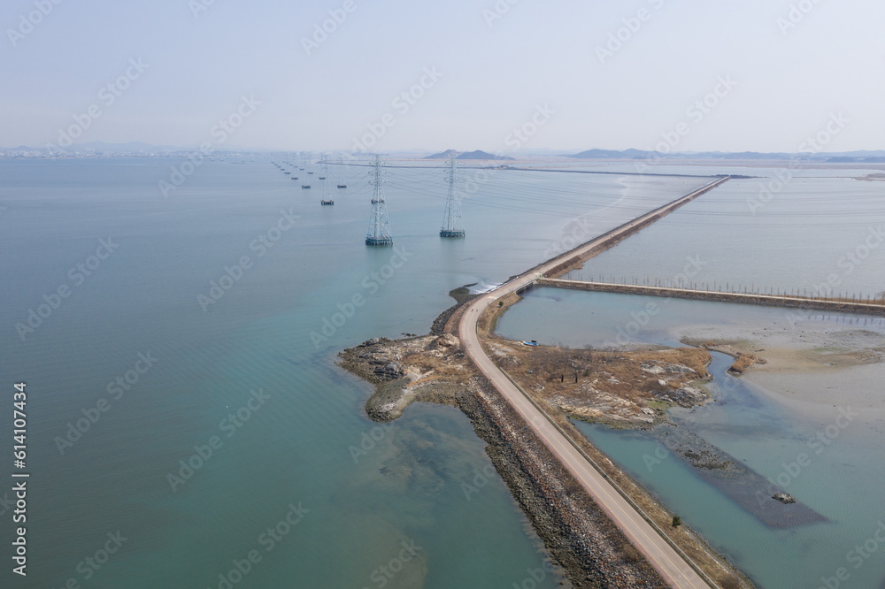 Fototapeta premium transmission tower on the sea 