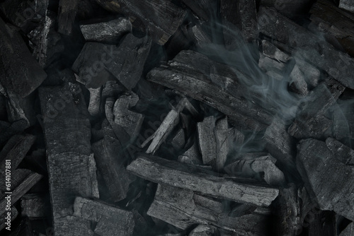 Fototapeta Naklejka Na Ścianę i Meble -  Black charcoal texture background. Close-up. Space for text.