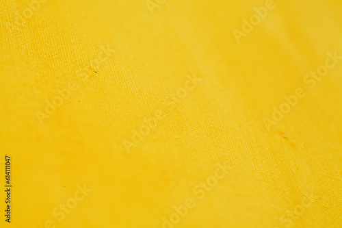 Canvas with a yellow ground color, uneven rough weave photo