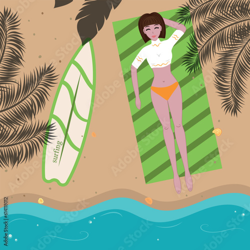 Beautiful girl in a swimsuit sunbathing on the beach near the sea