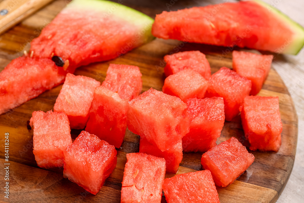 Board with pieces of fresh watermelon, closeup Board with pieces of fresh watermelon, closeup