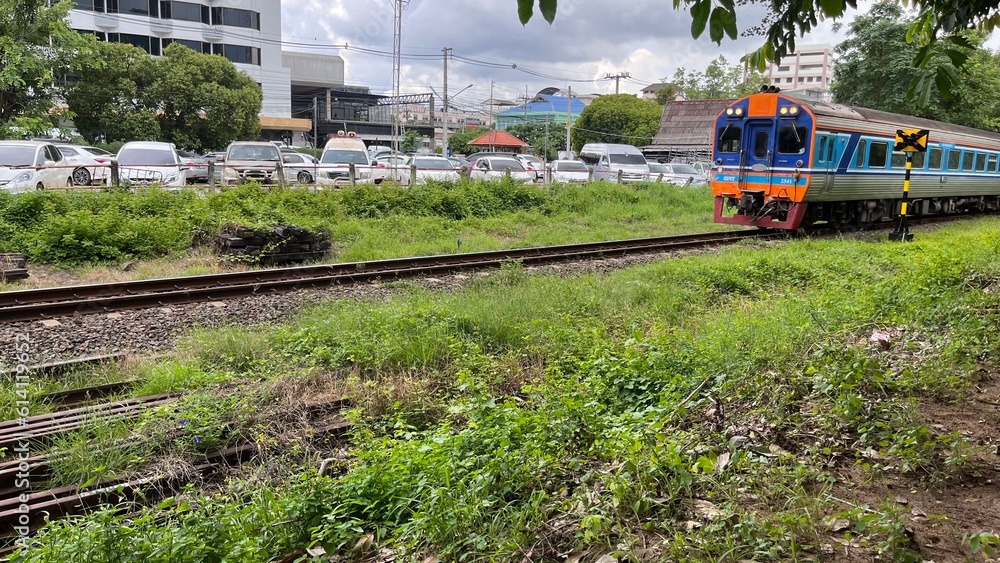 Naklejka premium train on the railway in the countryside