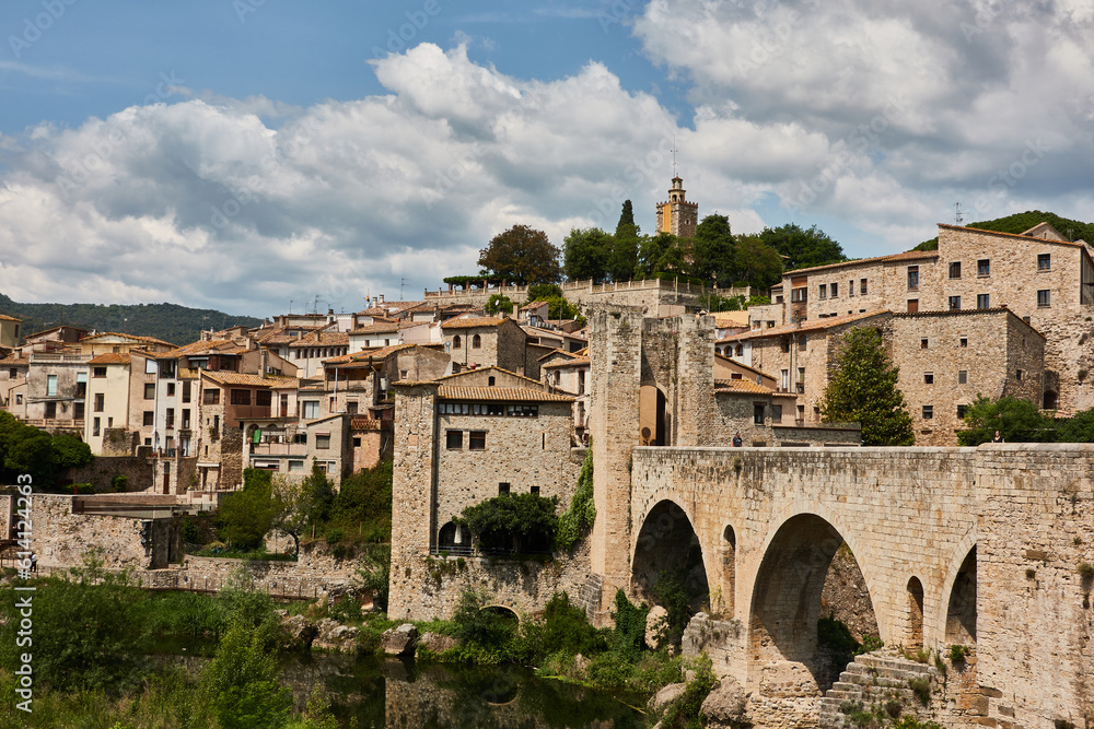 The Besalú bridge is a Romanesque bridge with arches and defensive towers built in the Middle Ages. Girona. Catalonia. Spain