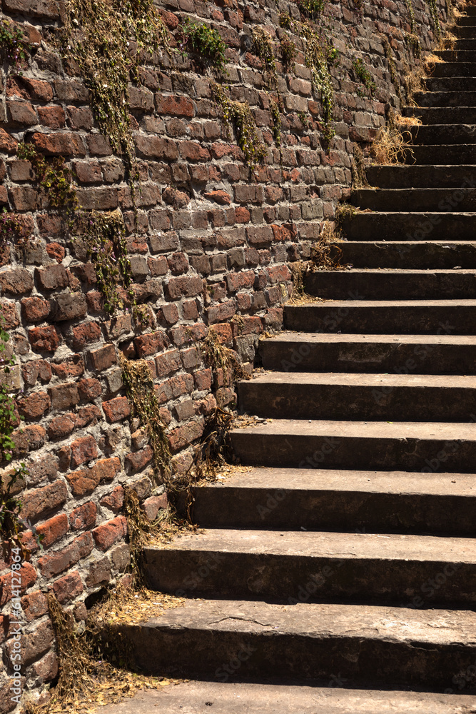 Stair in font brick wall.