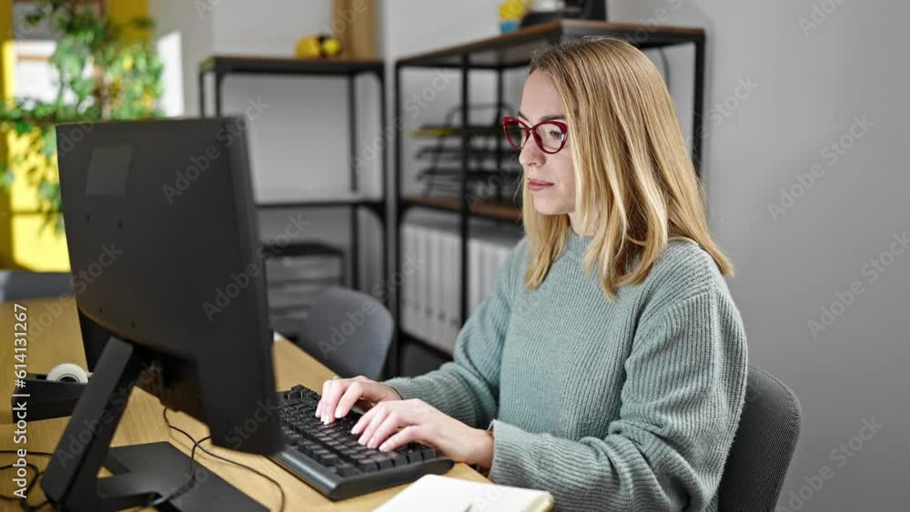 Young blonde woman business worker tired using computer working at office Young blonde woman business worker tired using computer working at office