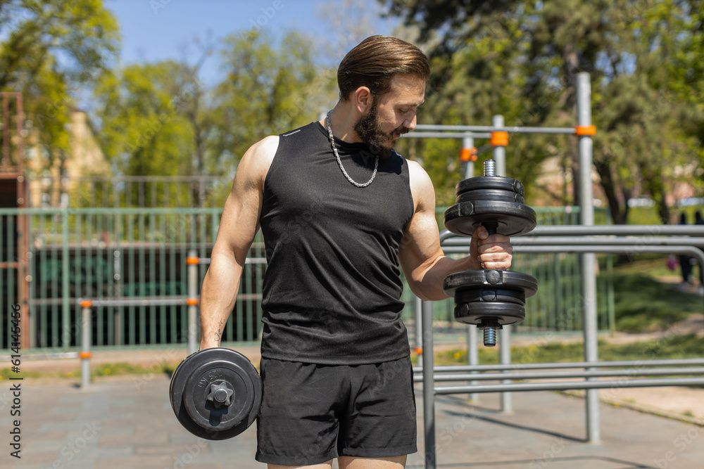Φωτογραφία Athletic lebanese man in sportswear doing arms weight lifting dumbbells exercises, pumping up arm bicep muscles