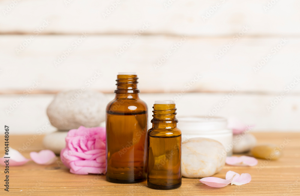 Spa composition with pink roses on wooden table Spa composition with pink roses on wooden table