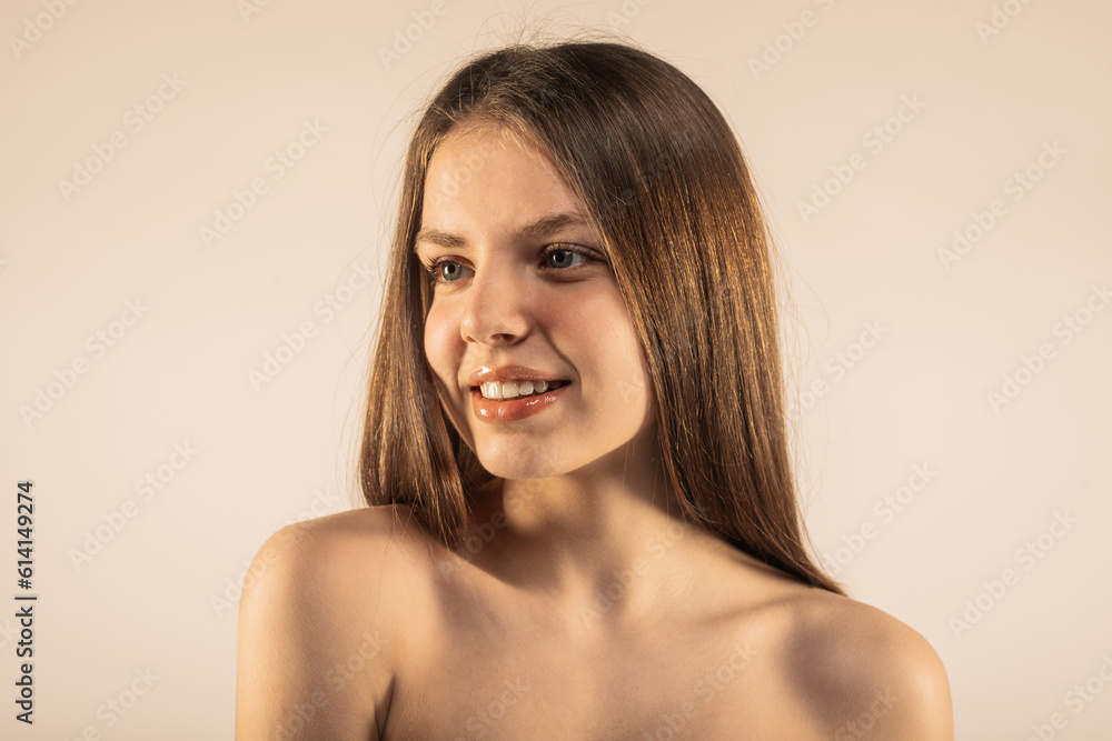 Beautiful smiley girl with clear face looking aside smiling Beautiful smiley girl with clear face looking aside smiling