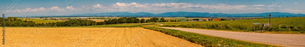 Fototapeta premium High resolution stitched spring panorama with the Bavarian forest in 50 km distance seen from near Ramsdorf, Deggendorf, Bavaria, Germany
