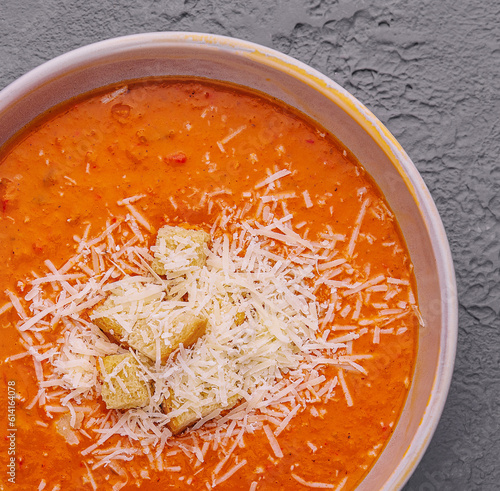 Pumpkin carrot cream soup with parmesan