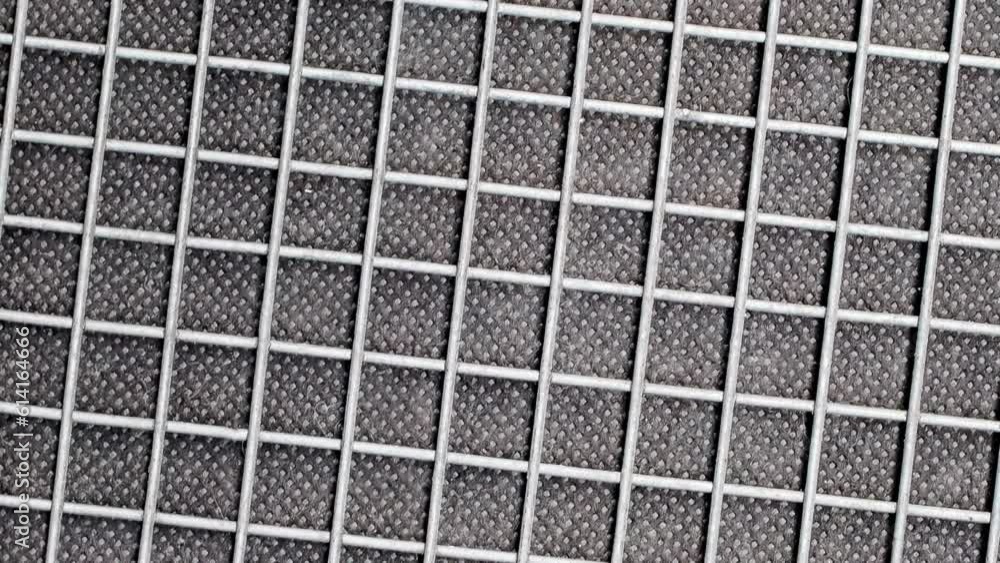 Background, air intake with metal mesh and black filter paper, rotating, turning, close-up macro
Background, air intake with metal mesh and black filter paper, rotating, turning, close-up macro