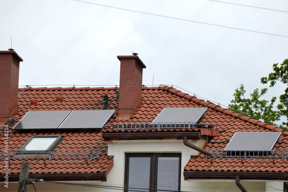 Installing a Solar Cell on a Roof.