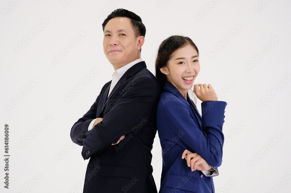 Young businesswoman and young businessman smiling on a white background. Young businesswoman and young businessman smiling on a white background.