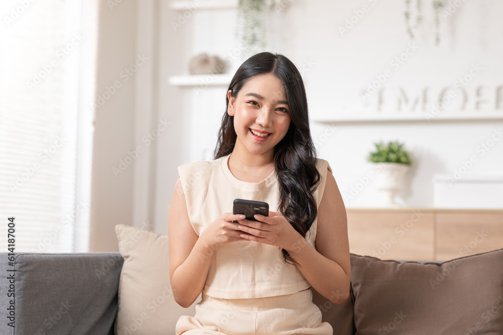 Happiness Entrepreneur beautiful business asian young woman wear casual use mobile phone for shopping online enjoy with social media and laptop at home.Small Business Startup.online banking Happiness Entrepreneur beautiful business asian young woman wear casual use mobile phone for shopping online enjoy with social media and laptop at home.Small Business Startup.online banking
