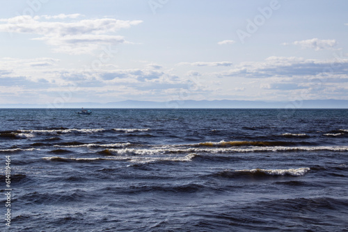 Lake Baikal shore with fresh water waves