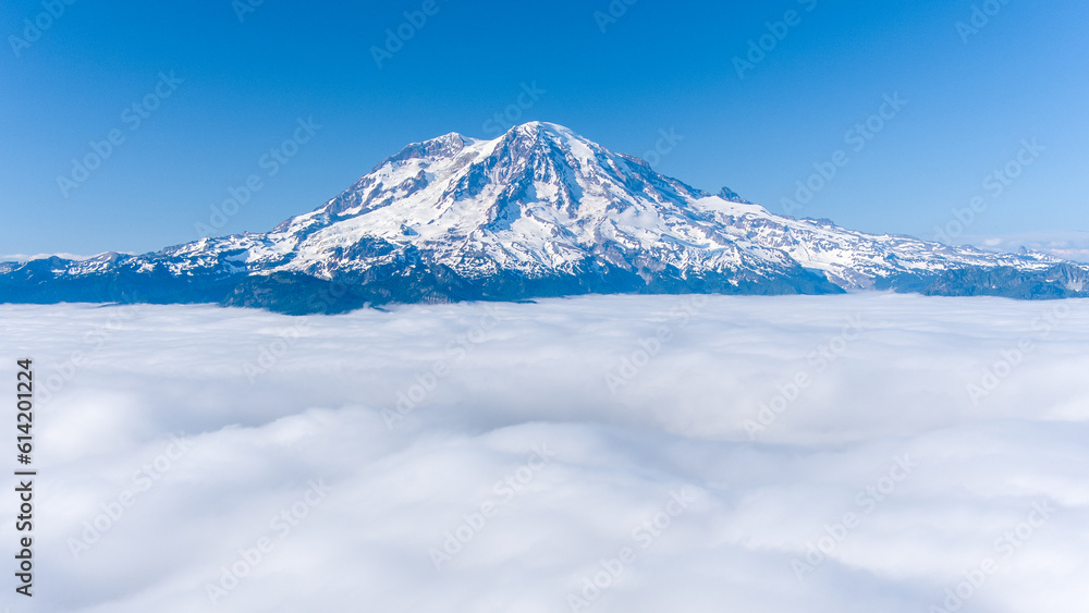 Mount Rainier and High Rock Lookout above the clouds Mount Rainier and High Rock Lookout above the clouds