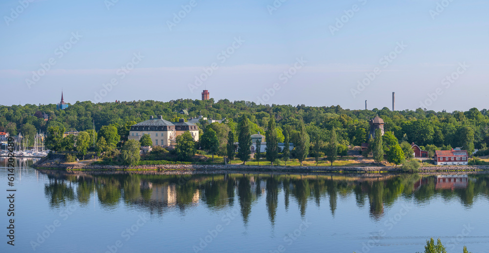 Panorama. The prince Eugene Museum on the ness Waldermarsudde, park and lint oil wind mill, a sunny summer morning in Stockholm