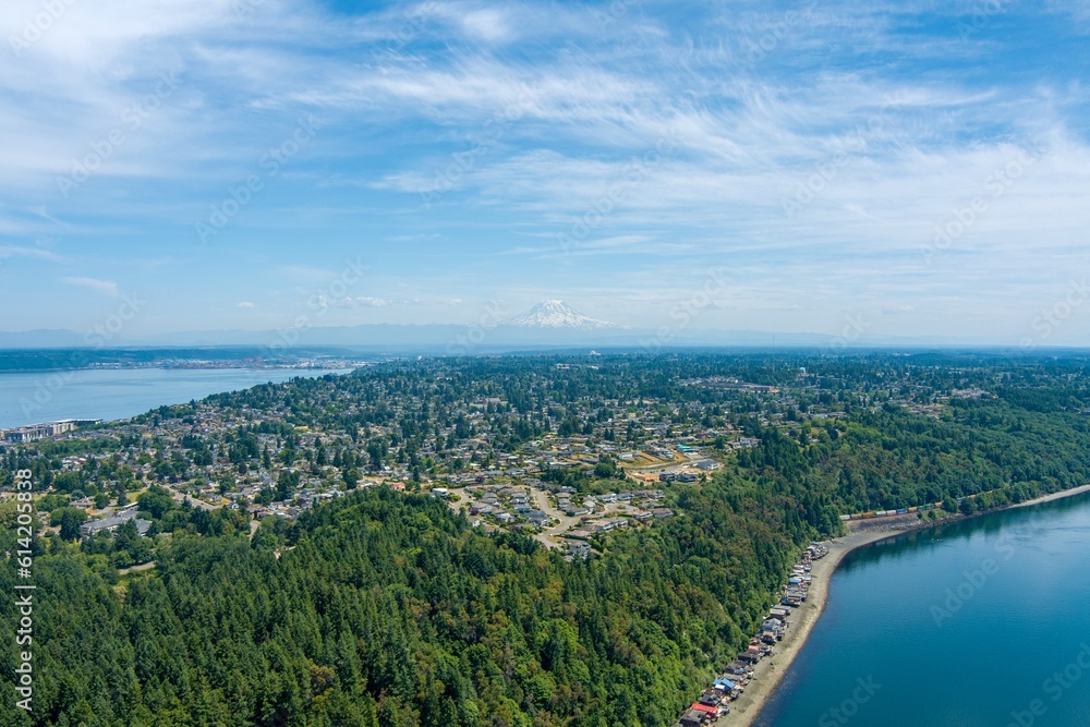 Aerial view of Point Defiance and Mount Rainier from Tacoma, Washington in June