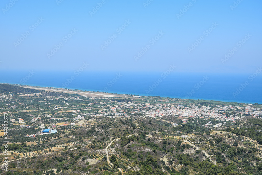 sea view on a clear summer day full of sun. Panorama of the island of Rhodes.