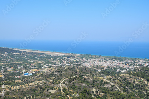 sea view on a clear summer day full of sun. Panorama of the island of Rhodes. © doda