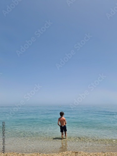 9 yearsold boy alone at the beach