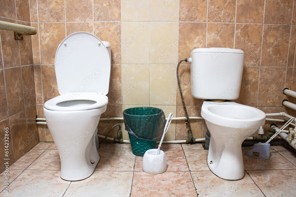 2 public toilets in poor condition. Old public toilets. 2 public toilets in poor condition. Old public toilets.