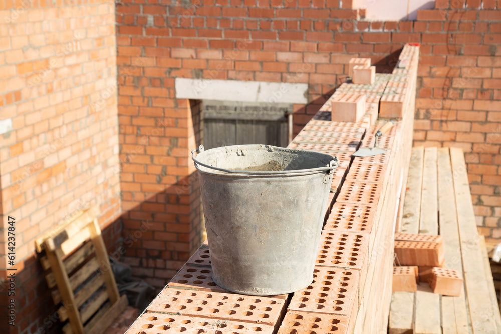 Laying bricks. Construction of a new house.Construction of a brick house. Laying bricks. Construction of a new house.Construction of a brick house.
