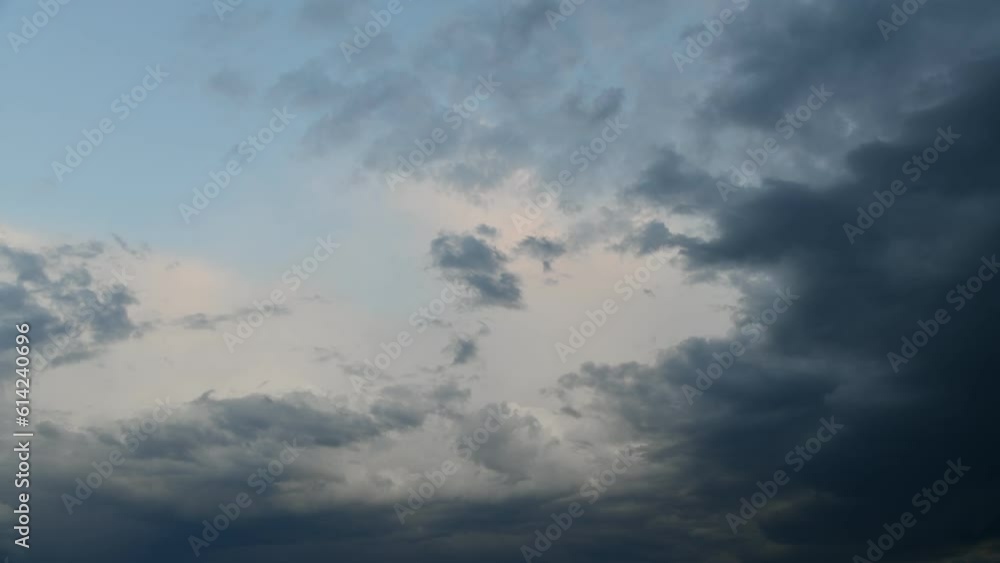 Time lapse video of dark rainy cumulus clouds moving on twilight sky. Abstract natural background. Weather forecast theme. Time lapse video of dark rainy cumulus clouds moving on twilight sky. Abstract natural background. Weather forecast theme.