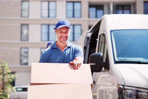 Delivery Man With Handtruck © Andrey Popov