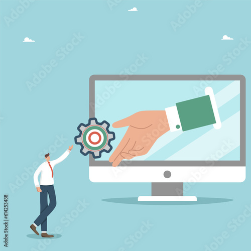Team support to achieve the highest result, analysis and solution of complex problems, support and mutual assistance to find a way out of business problem, big hand gives man gear from monitor screen.