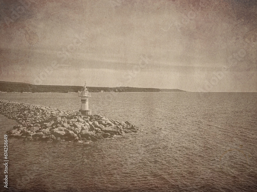 Kalekoy lighthouse view from the sea of Gokceada. Vintage backgroun, wallpaper photo