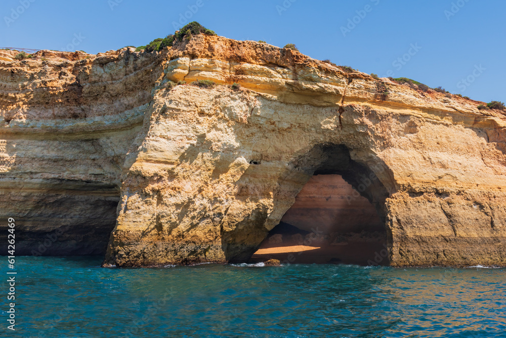 Benagil cave seen from the sea on the cliffs of the Algarve, Portugal.