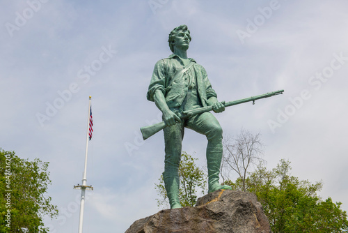 Minute Man Statue in Battle Green in historic town center of Lexington, Massachusetts MA, USA.  photo
