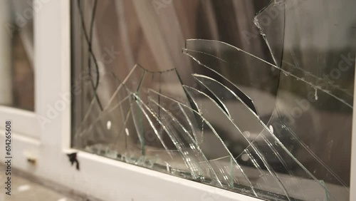 View broken window.Crash glass broken window house destroy building window crack