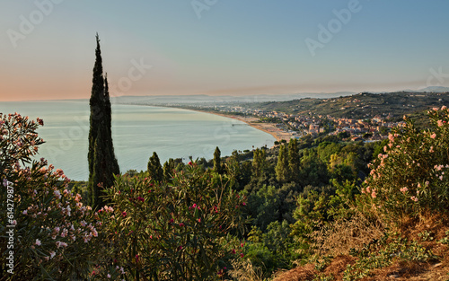 Vasto, Abruzzo, Italy: landscape at sunrise of the the gulf of the adriatic sea with the beach and the ancient city