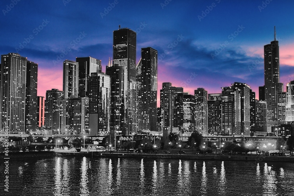 Fototapeta premium Chicago City at dusk. Contrasts of Buildings and skyline.