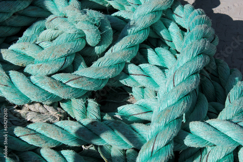 Fishing ship, texture turquoise rope on the ship