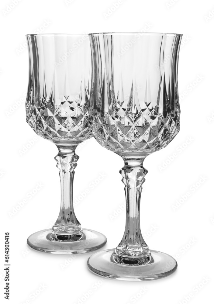 Elegant clean empty wine glasses isolated on white Elegant clean empty wine glasses isolated on white