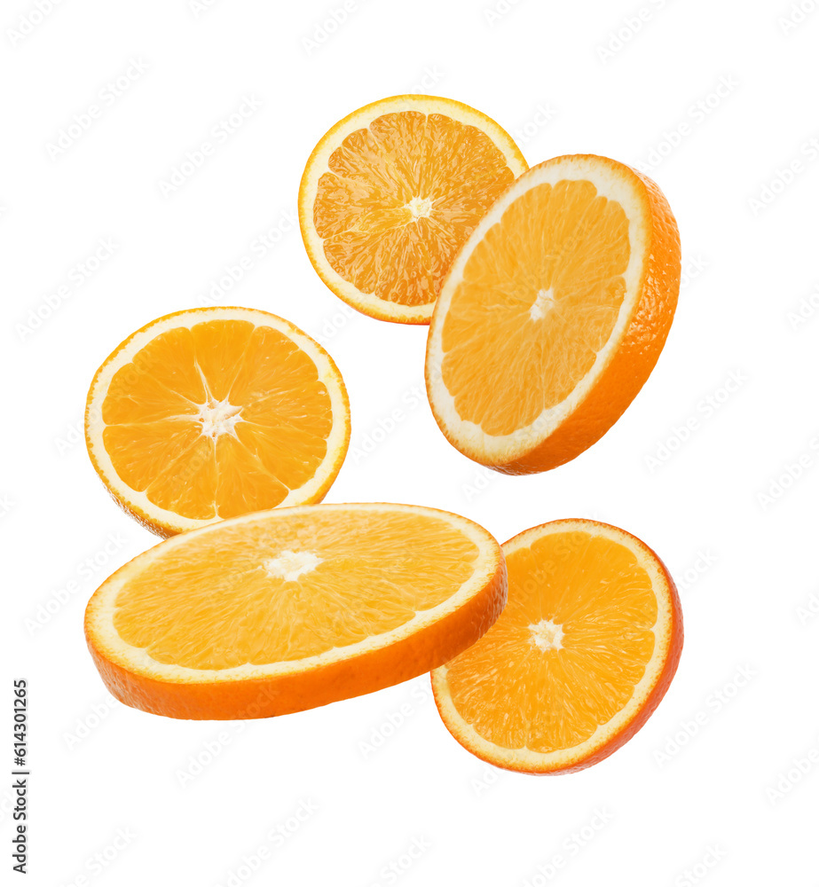 Juicy orange slices flying on white background