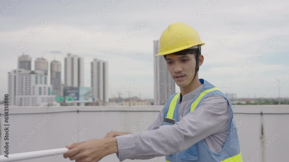 Workers cleaning solar panels on the top floor of the building. Workers cleaning solar panels on the top floor of the building.