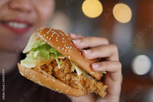 person eating burger