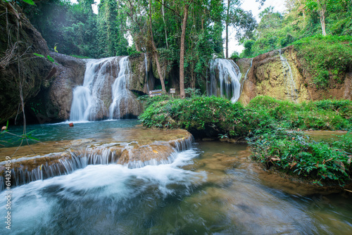 Beautiful tropical raingorest waterfall turquoise water serenity nature landscape