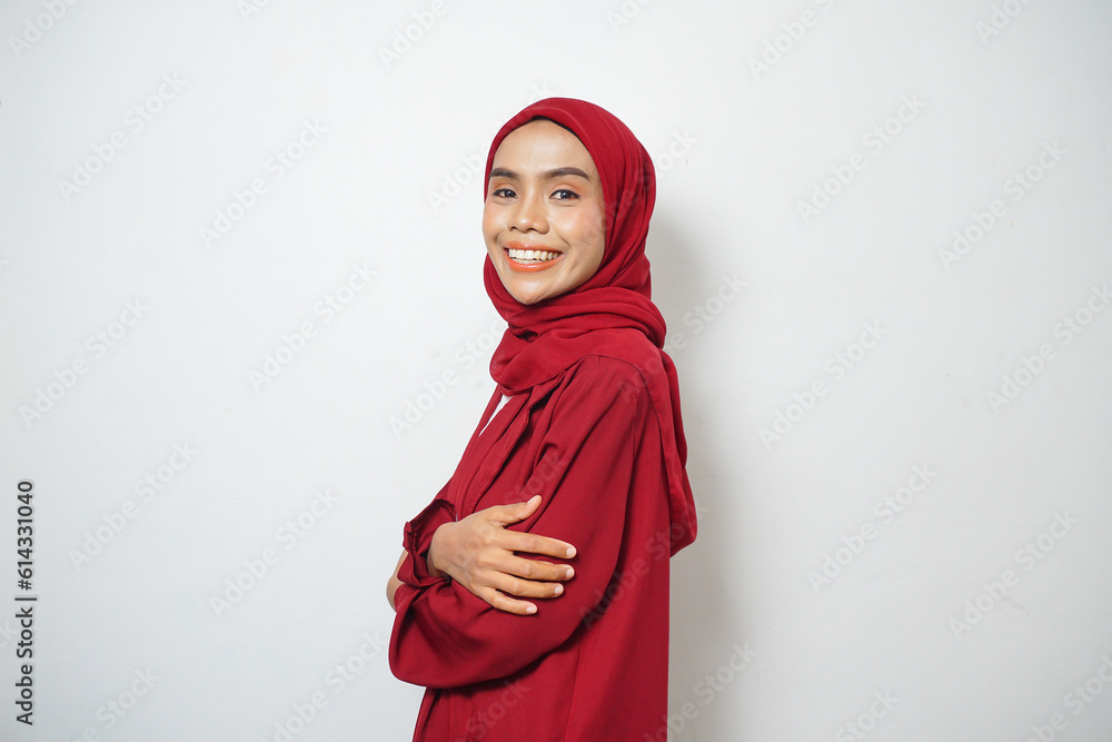 Asian business Muslim woman ini red casual smiling happy and looking confident Asian business Muslim woman ini red casual smiling happy and looking confident