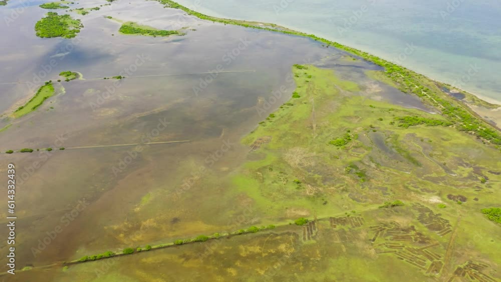 Top view of flooded land in Sri Lanka during the rainy season. Top view of flooded land in Sri Lanka during the rainy season.