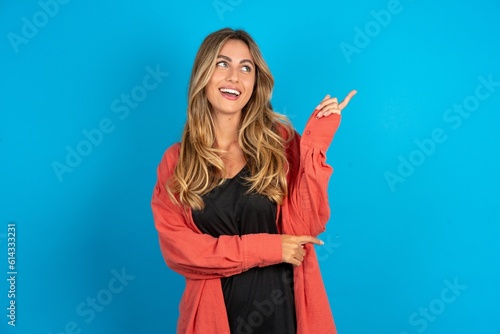 Photo of attractive young beautiful blonde woman wearing overshirt direct finger empty space cheap dentistry